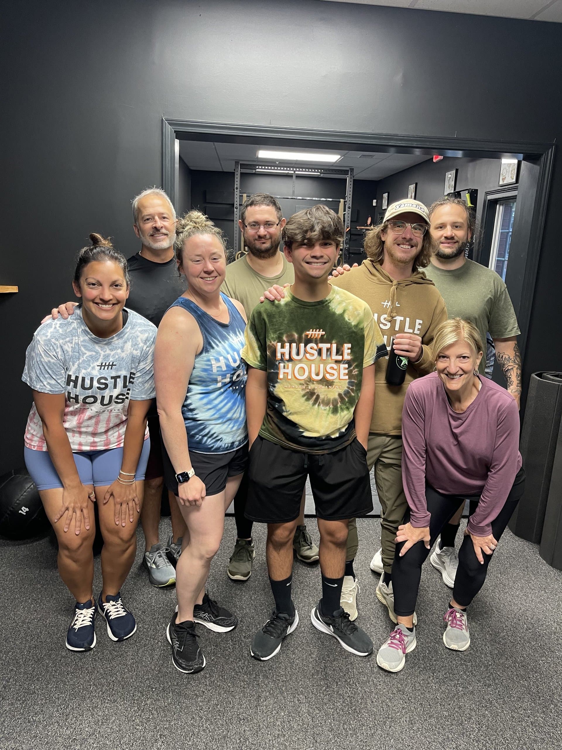 Members of Hustle House Health & Wellness together in the studio in Woodstock, GA
