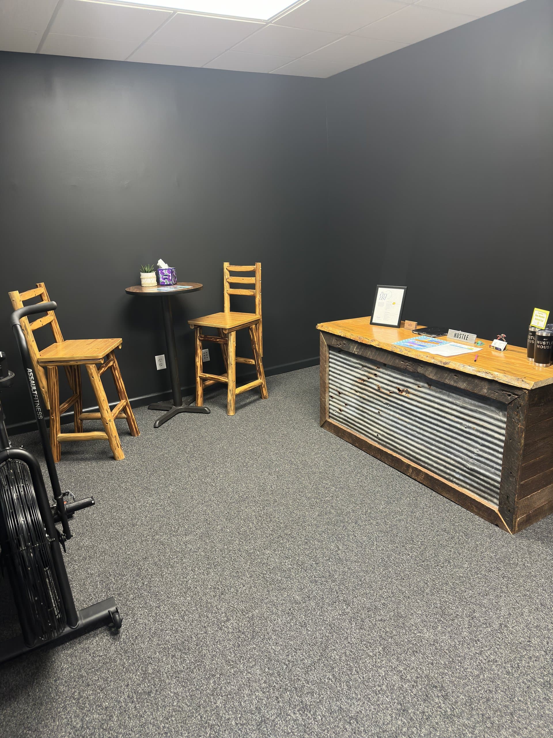 The reception and waiting area at Hustle House Health & Wellness in Woodstock, GA